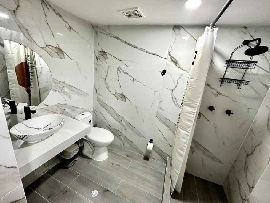 Exclusivos Apartamentos Con Playa Privada Сан-Андрес Номер фото